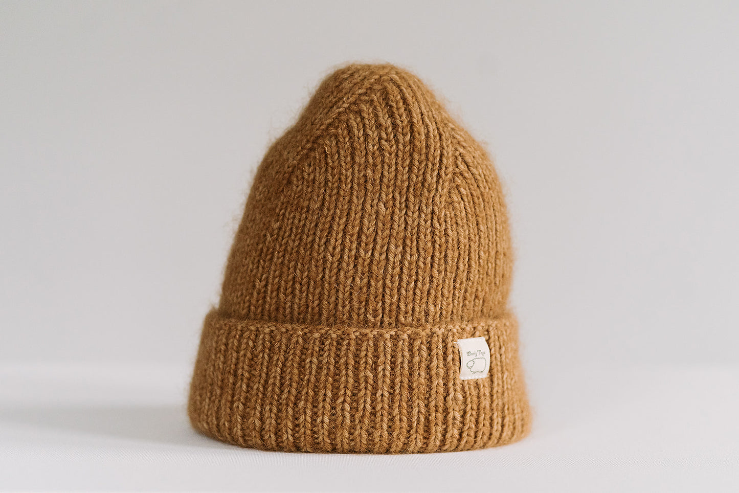 Hand-knitted Wooly Top hat in camel.
